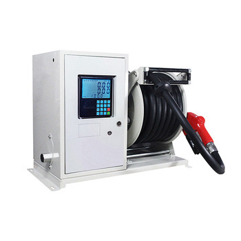 Compact fuel dispenser with hose reel and nozzle